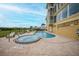 Resort-style pool and spa area perfect for relaxation and outdoor enjoyment at 115 Breakers Ct # 111, Punta Gorda, FL 33950