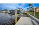 Private boat lift on a canal, perfect for enjoying Florida's waterways at 1320 Appian Dr, Punta Gorda, FL 33950