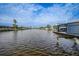 Tranquil waterfront view down a canal with boats and homes at 1320 Appian Dr, Punta Gorda, FL 33950