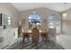 Elegant dining area with water views and ample natural light at 1320 Appian Dr, Punta Gorda, FL 33950