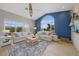 Spacious living room with comfy sofas, large windows, and a view at 1320 Appian Dr, Punta Gorda, FL 33950