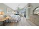 Main bedroom with large bed, dresser, and private balcony at 1320 Appian Dr, Punta Gorda, FL 33950