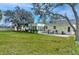Backyard with patio furniture and a view of the house at 13366 Bronze Ave, Port Charlotte, FL 33981