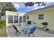Concrete patio with table, chairs, and grill at 13366 Bronze Ave, Port Charlotte, FL 33981
