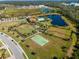 Community features a pool, clubhouse, basketball court, and open green spaces at 13742 Green Hammock Pl, Bradenton, FL 34211