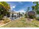 Private backyard with patio furniture and fire pit at 15105 Aldama Cir, Port Charlotte, FL 33981