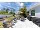 Enjoy outdoor living on this large patio with seating and a grill at 15105 Aldama Cir, Port Charlotte, FL 33981