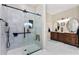 Large walk-in shower with glass enclosure and modern fixtures at 15105 Aldama Cir, Port Charlotte, FL 33981