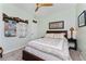Bedroom with ceiling fan and wooden furniture at 15105 Aldama Cir, Port Charlotte, FL 33981