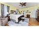 Spacious primary bedroom with ample natural light and wood flooring at 15105 Aldama Cir, Port Charlotte, FL 33981