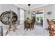 Bright breakfast nook with access to the pool area at 15105 Aldama Cir, Port Charlotte, FL 33981