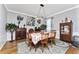 Elegant dining room featuring hardwood floors and a chandelier at 15105 Aldama Cir, Port Charlotte, FL 33981