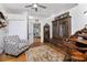 Home office with hardwood floors, built-in gun safe, and antique furniture at 15105 Aldama Cir, Port Charlotte, FL 33981