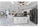 Spacious kitchen with granite countertops and stainless steel appliances at 15105 Aldama Cir, Port Charlotte, FL 33981