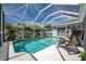Relaxing screened pool with comfortable seating area at 15105 Aldama Cir, Port Charlotte, FL 33981