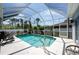 Inviting, screened pool with ample deck space for relaxation at 15105 Aldama Cir, Port Charlotte, FL 33981