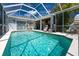 Large screened pool perfect for relaxation and enjoyment at 15105 Aldama Cir, Port Charlotte, FL 33981