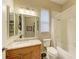 Bathroom with tub, shower, and granite countertop at 1551 Atares Dr # 112, Punta Gorda, FL 33950