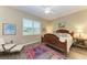 Spacious bedroom with wood flooring and a large bed at 1551 Atares Dr # 112, Punta Gorda, FL 33950