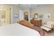 Comfortable bedroom with ensuite access and views of the kitchen at 1551 Atares Dr # 112, Punta Gorda, FL 33950