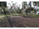 Two sets of swings in a shady park setting at 17074 Acapulco Rd # 112, Punta Gorda, FL 33955