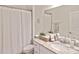 Clean bathroom with granite vanity and shower at 17764 Palmetto Pass Ln, Punta Gorda, FL 33982
