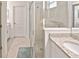 Clean bathroom with a large shower and granite countertop at 17764 Palmetto Pass Ln, Punta Gorda, FL 33982