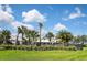 Community clubhouse and pool area with lush landscaping at 17764 Palmetto Pass Ln, Punta Gorda, FL 33982
