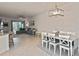 Open concept dining room adjacent to kitchen and living room at 17764 Palmetto Pass Ln, Punta Gorda, FL 33982