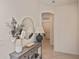Entryway with console table, mirror, and view of hallway at 17764 Palmetto Pass Ln, Punta Gorda, FL 33982