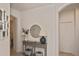 Bright entryway with console table and mirror at 17764 Palmetto Pass Ln, Punta Gorda, FL 33982