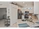 Modern kitchen with granite countertops and stainless steel appliances at 17764 Palmetto Pass Ln, Punta Gorda, FL 33982