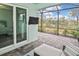 Relaxing screened patio with paver stones and view of lush landscaping at 17764 Palmetto Pass Ln, Punta Gorda, FL 33982