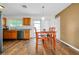 Cozy dining area with wood table and chairs near kitchen at 18235 Avonsdale Cir, Port Charlotte, FL 33948