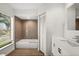 Bathroom with bathtub, modern tile and vanity at 1849 Jamaica Way, Punta Gorda, FL 33950