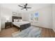 Guest bedroom with ceiling fan and wood flooring at 1849 Jamaica Way, Punta Gorda, FL 33950