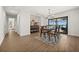 Bright dining room with water views and a wooden dining table at 1849 Jamaica Way, Punta Gorda, FL 33950