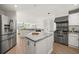 Modern kitchen with granite countertops and stainless steel appliances at 1849 Jamaica Way, Punta Gorda, FL 33950