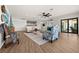 Living room with comfortable seating, hardwood floors and water views at 1849 Jamaica Way, Punta Gorda, FL 33950