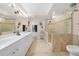 Large bathroom with double vanity and walk-in shower at 200 Harbor Walk Dr # 144, Punta Gorda, FL 33950