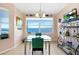 Waterfront dining area with glass table and bay views at 200 Harbor Walk Dr # 144, Punta Gorda, FL 33950