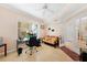 Bright home office features built-in shelving and comfortable seating at 200 Harbor Walk Dr # 144, Punta Gorda, FL 33950