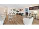 Light and airy living room with hardwood floors and access to lanai at 200 Harbor Walk Dr # 144, Punta Gorda, FL 33950