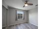 Bright bedroom with wood-look floors and window at 20037 Sancraft Ave, Port Charlotte, FL 33954