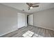 Well-lit bedroom with wood-look floors and ceiling fan at 20037 Sancraft Ave, Port Charlotte, FL 33954