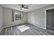 Bedroom featuring wood-look floors and a large window at 20037 Sancraft Ave, Port Charlotte, FL 33954