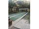 Outdoor shuffleboard courts nestled among trees at 20037 Sancraft Ave, Port Charlotte, FL 33954