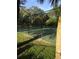 Outdoor tennis court with chain link fence at 20037 Sancraft Ave, Port Charlotte, FL 33954
