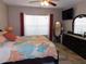 Comfortable bedroom featuring a king-size bed and plenty of natural light at 2180 Heron Lake Dr # 108, Punta Gorda, FL 33983