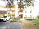 Condo building with parking and landscaping at 2180 Heron Lake Dr # 108, Punta Gorda, FL 33983